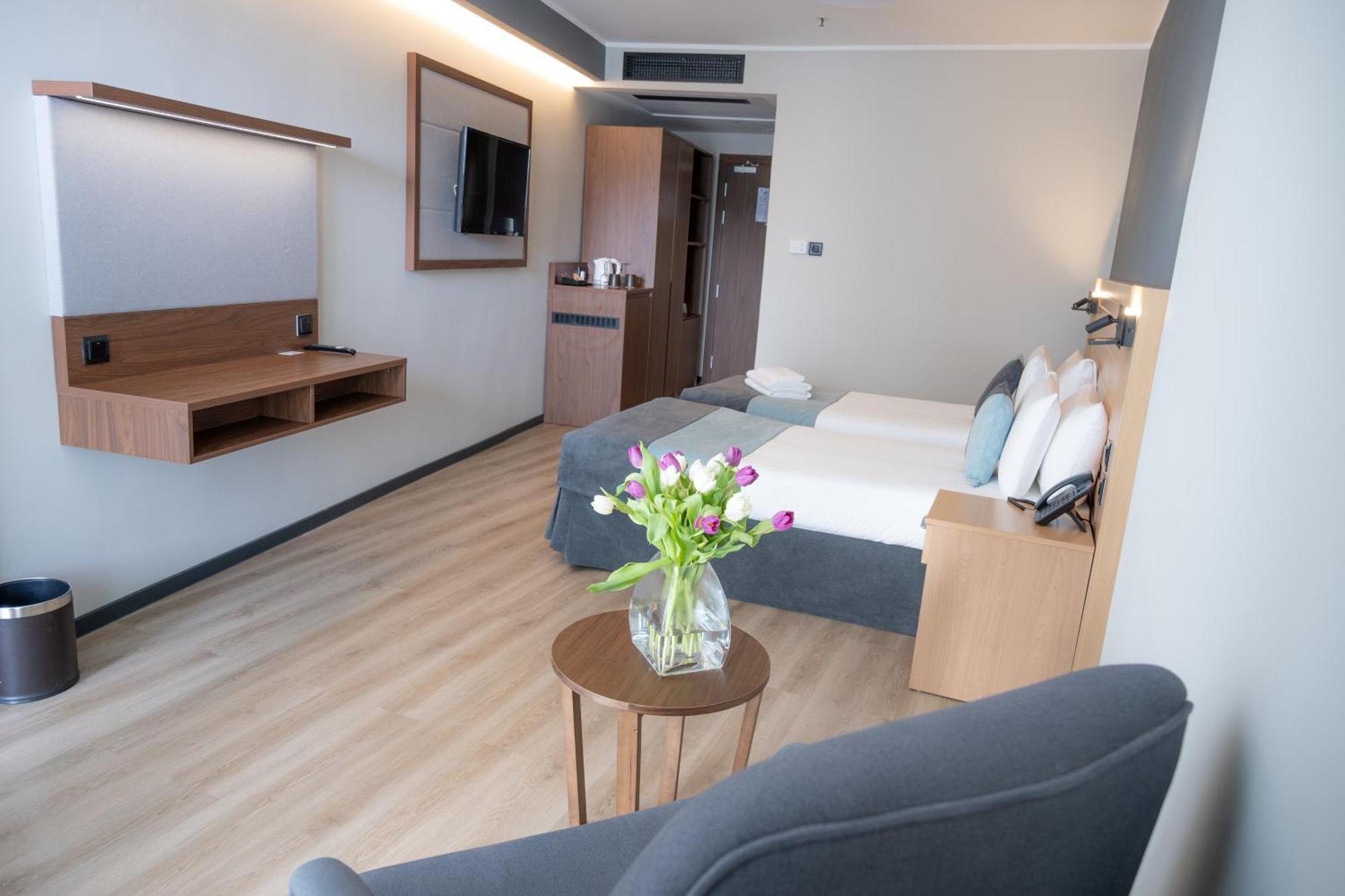Tweepersoonskamer met 1 of 2 Bedden en Balkon